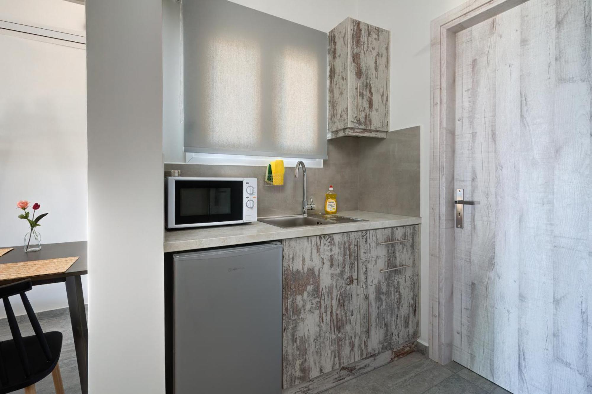 Molos Beachfront Apartments In ディアコプト 部屋 写真